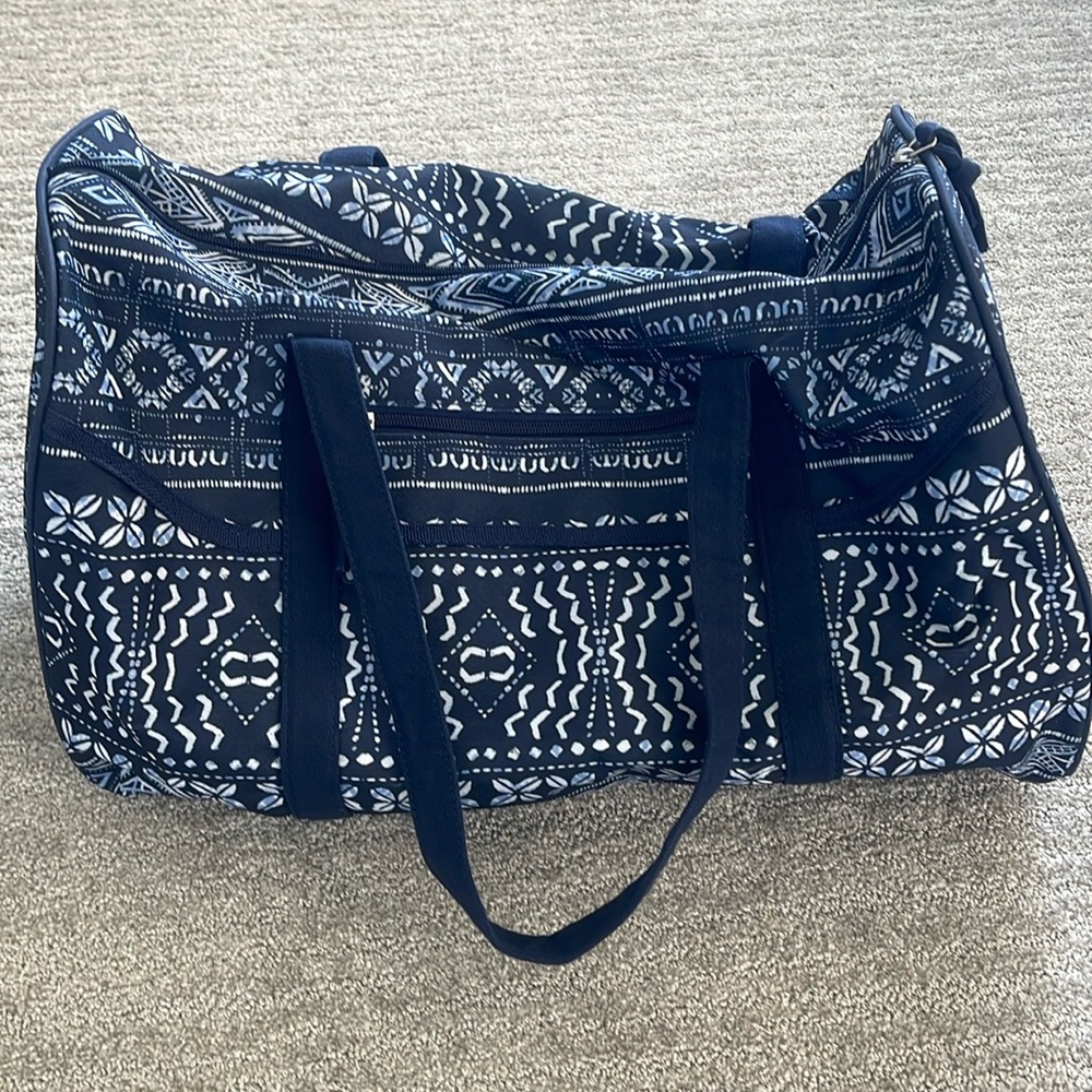 Blue and white duffel bag